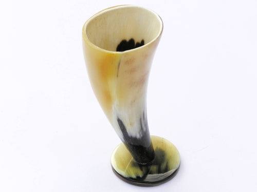 Hand-crafted Odin's Chalice drinking horn with beeswax coating and wooden stand, inspired by Norse tradition